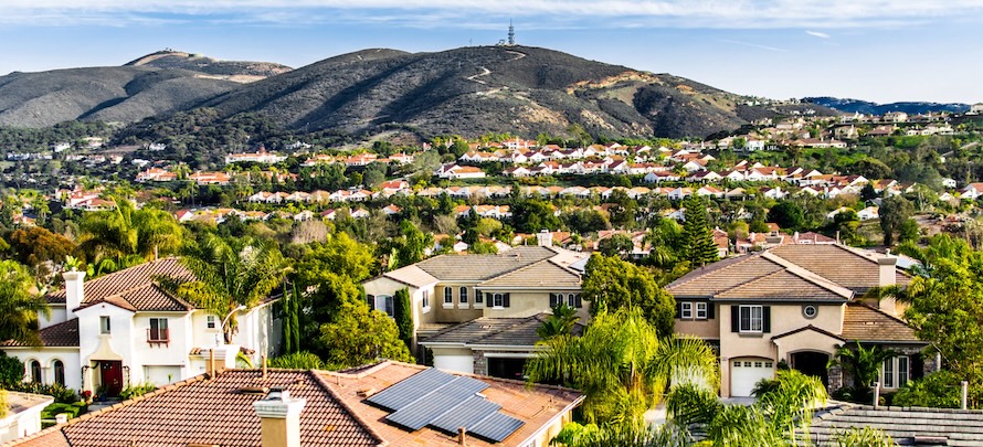 Scenic view of San Marcos, California featuring a gate and garage door